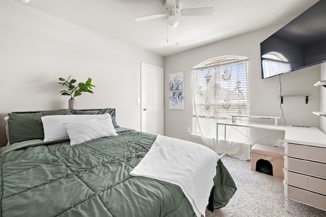 bedroom featuring ceiling fan and carpet floors