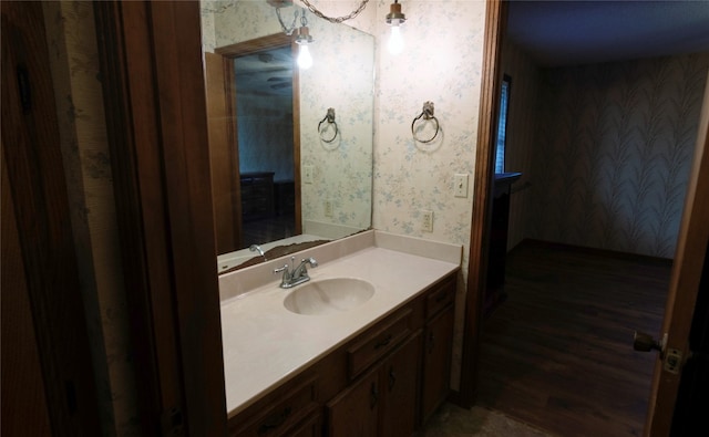 bathroom featuring wood-type flooring and vanity