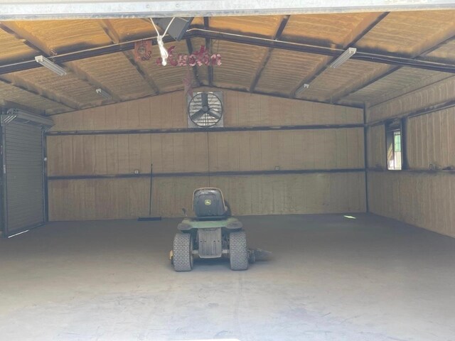 garage with wood walls