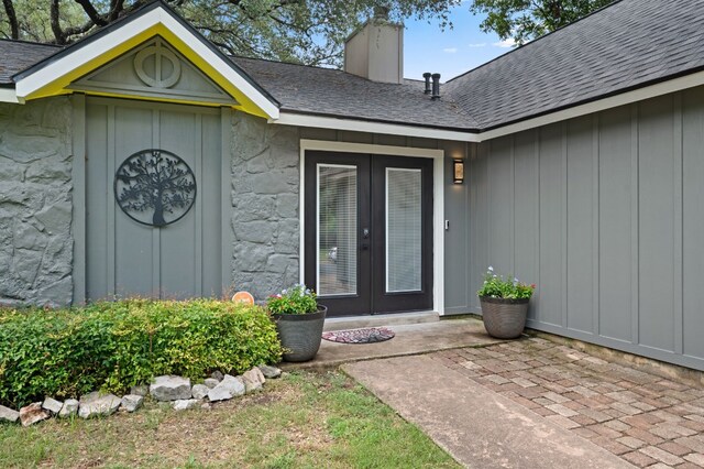 entrance to property featuring french doors