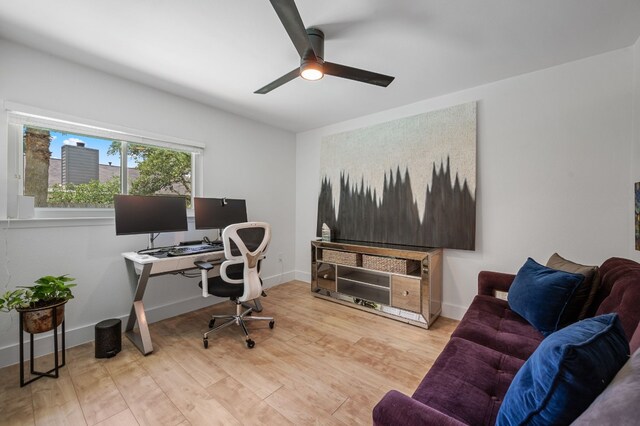 office area featuring wood-type flooring and ceiling fan