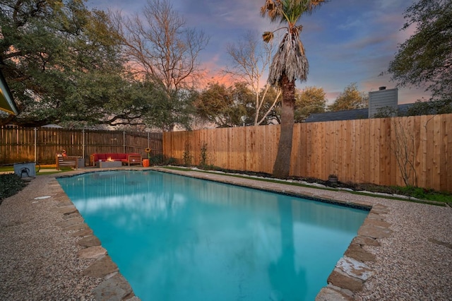 view of pool featuring a fenced backyard and a fenced in pool