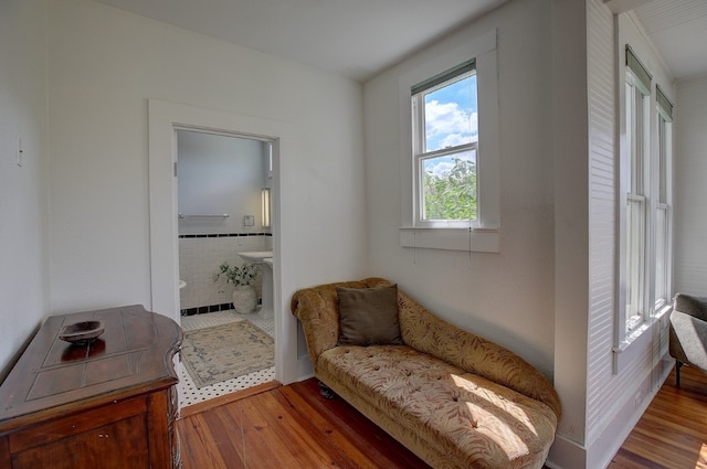 sitting room featuring hardwood / wood-style floors