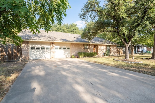 ranch-style home with a garage