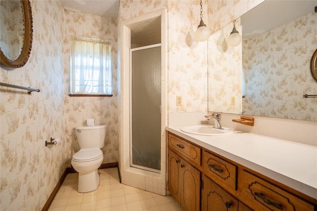 bathroom featuring tile patterned floors, an enclosed shower, vanity, and toilet