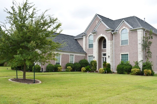 view of front of property with a front lawn