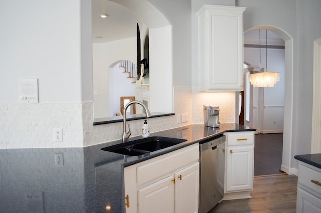 kitchen featuring sink, white cabinets, and stainless steel dishwasher