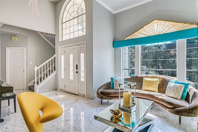 entryway featuring ornamental molding