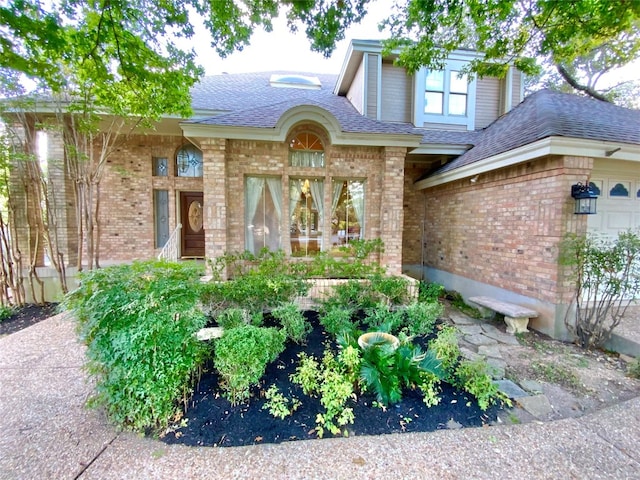 entrance to property featuring a garage