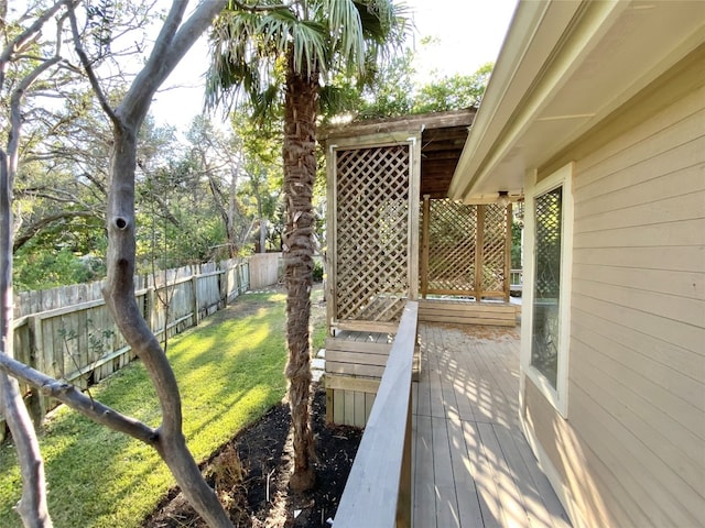 view of yard with a wooden deck