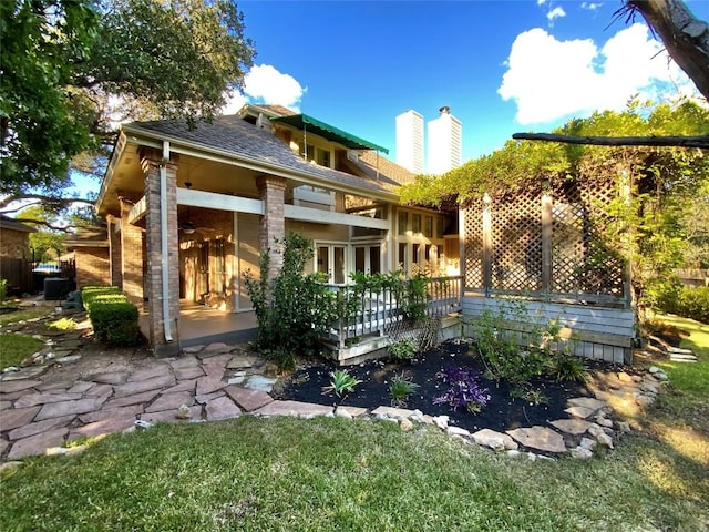 7011 Quill Leaf Cv, Austin, TX 78750 - back of property featuring a chimney and a balcony