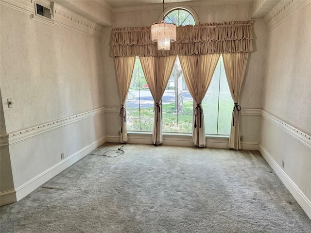 7011 Quill Leaf Cv, Austin, TX 78750 - carpeted spare room featuring a chandelier