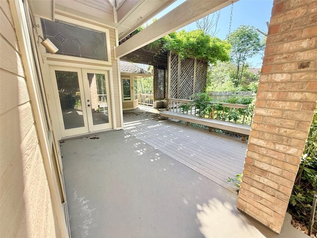 7011 Quill Leaf Cv, Austin, TX 78750 - view of patio featuring french doors and a wooden deck