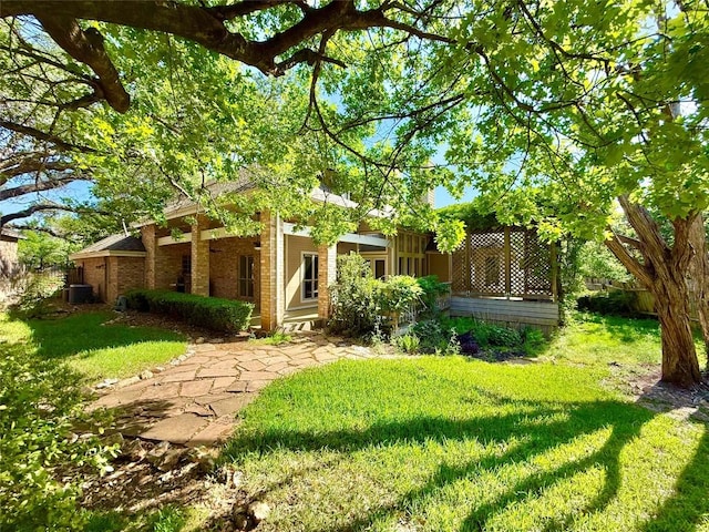 7011 Quill Leaf Cv, Austin, TX 78750 - view of green lawn with a porch