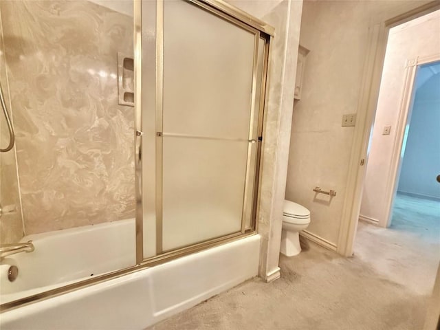 7011 Quill Leaf Cv, Austin, TX 78750 - bathroom featuring toilet and bath / shower combo with glass door