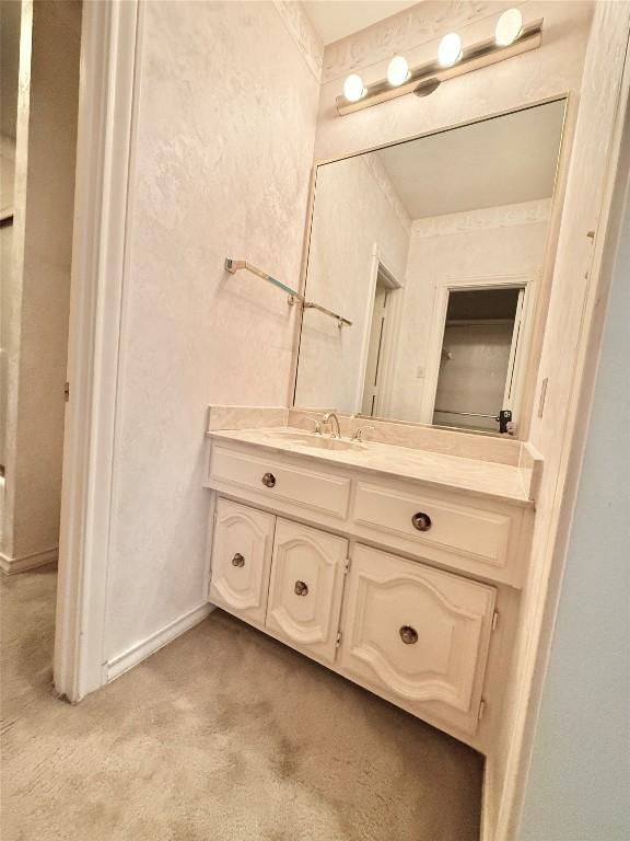 7011 Quill Leaf Cv, Austin, TX 78750 - bathroom featuring vanity