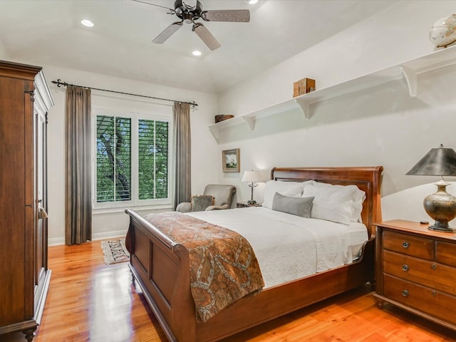 bedroom with light wood-type flooring and ceiling fan