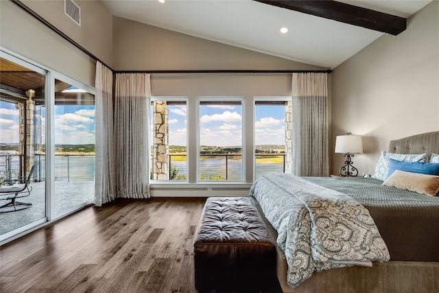 bedroom featuring wood-type flooring, a water view, lofted ceiling with beams, and access to exterior