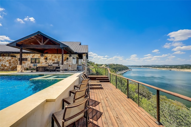 view of pool featuring a gazebo, a water view, and an outdoor hangout area