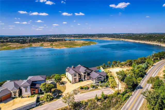 drone / aerial view with a water view