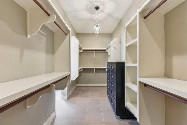 1612 Watercliffe Dr, Lago Vista, TX 78645 - walk in closet with light tile patterned floors