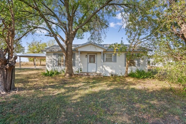 view of front of home with a front yard