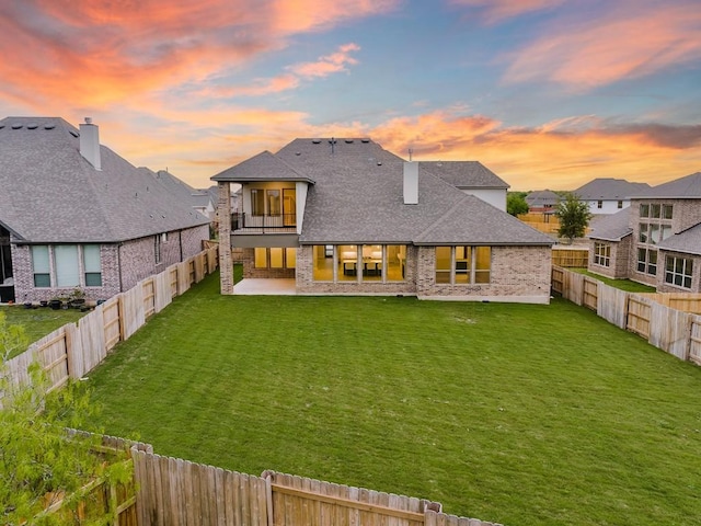 105 Bull Ridge Trl, Georgetown, TX 78628 - rear view of property with a patio area, a balcony, a shingled roof, and a residential view