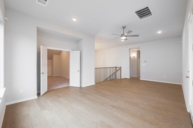 105 Bull Ridge Trl, Georgetown, TX 78628 - spare room with light wood finished floors, a ceiling fan, recessed lighting, and baseboards