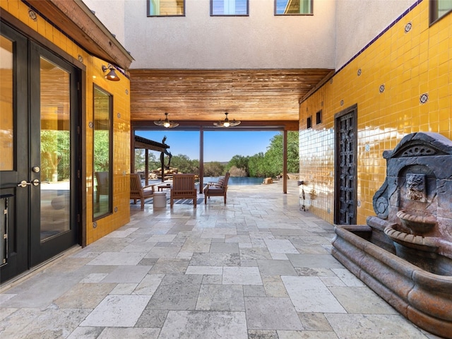 view of patio / terrace with an outdoor hangout area and french doors