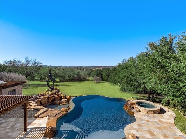 view of swimming pool featuring an in ground hot tub, a patio area, and a yard