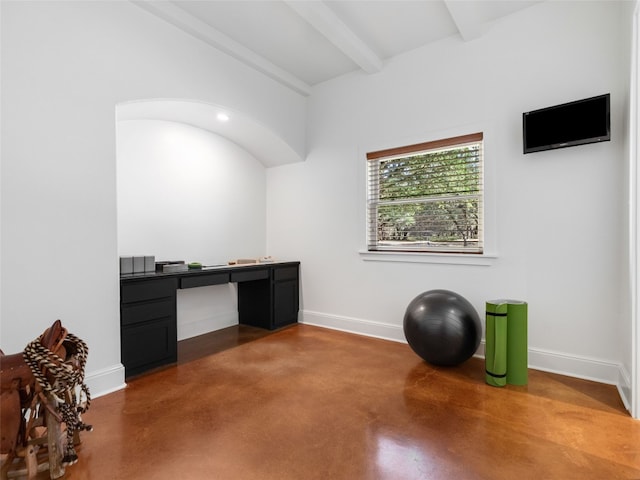 office area with concrete floors and beam ceiling