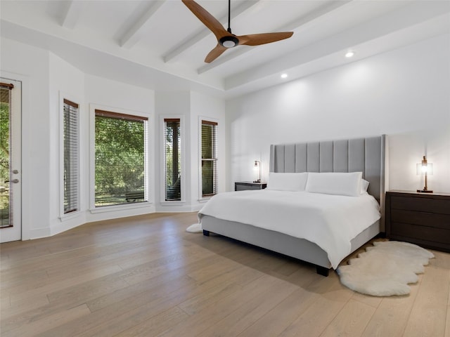 bedroom with ceiling fan, light hardwood / wood-style flooring, and access to exterior