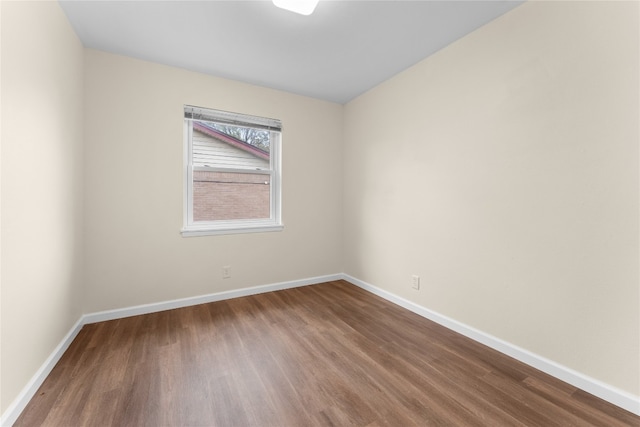 empty room featuring hardwood / wood-style flooring