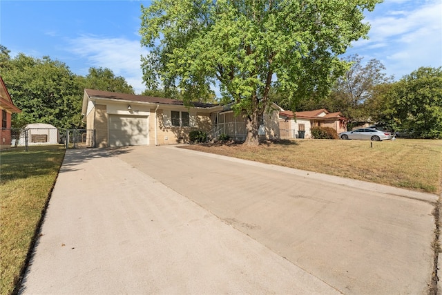 single story home with a front yard and a garage