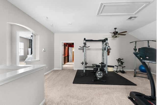 3109 Wild Rock Cv, Austin, TX 78732 - exercise area with light carpet, arched walkways, a ceiling fan, baseboards, and visible vents