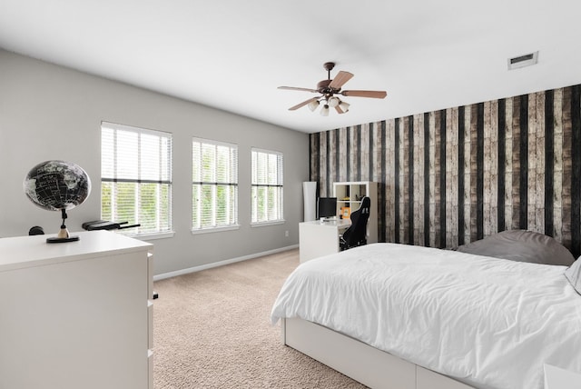 bedroom featuring light colored carpet