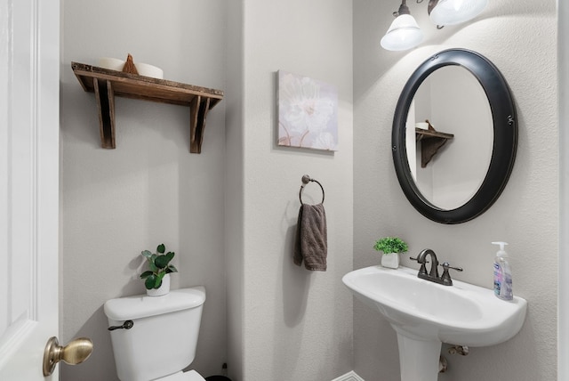 3109 Wild Rock Cv, Austin, TX 78732 - half bathroom with a sink and toilet