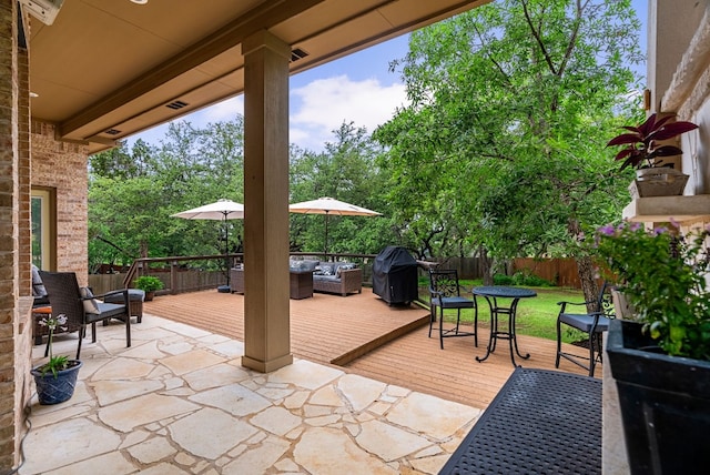 3109 Wild Rock Cv, Austin, TX 78732 - view of patio with a fenced backyard, an outdoor hangout area, area for grilling, and a deck