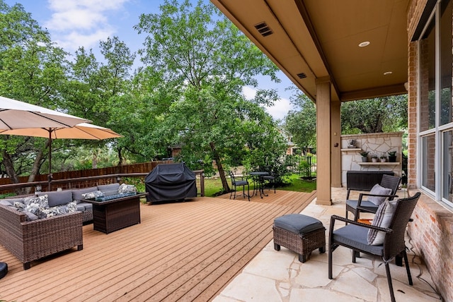 3109 Wild Rock Cv, Austin, TX 78732 - wooden terrace featuring outdoor lounge area, fence, grilling area, outdoor dining area, and visible vents