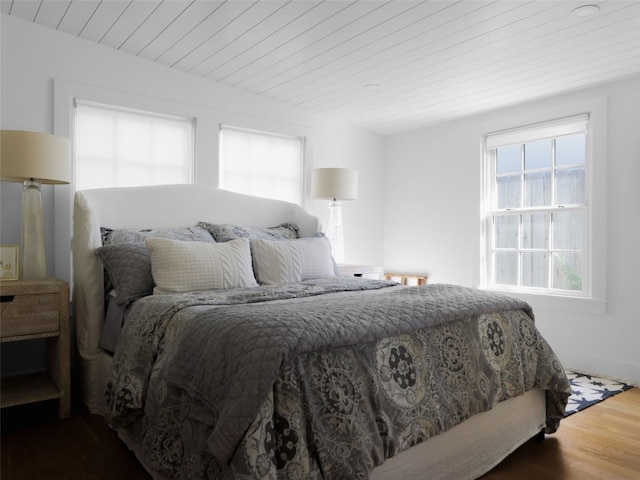 bedroom with hardwood / wood-style flooring