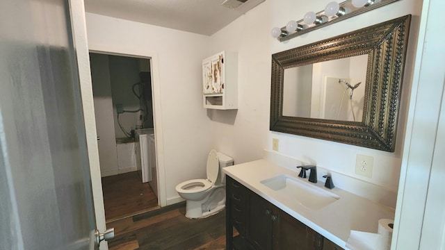 bathroom with curtained shower, wood-type flooring, vanity, and toilet