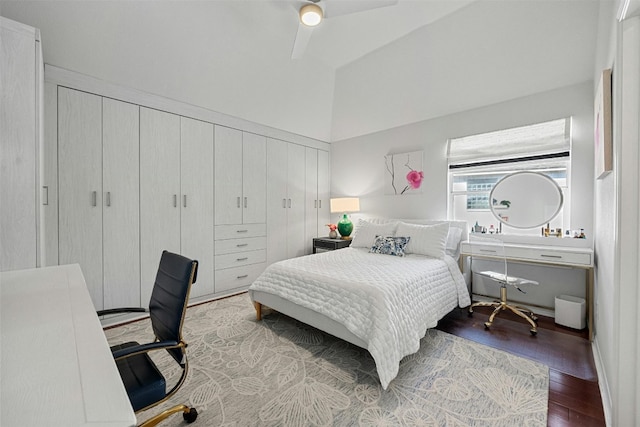 bedroom featuring vaulted ceiling, ceiling fan, and hardwood / wood-style flooring