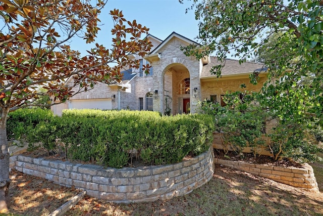 9228 Limoncillo Dr, Austin, TX 78750 - view of front facade featuring brick siding and roof with shingles