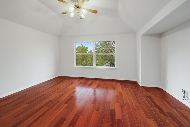 9228 Limoncillo Dr, Austin, TX 78750 - empty room featuring a ceiling fan, wood finished floors, and vaulted ceiling