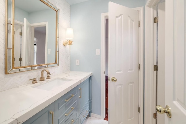 9228 Limoncillo Dr, Austin, TX 78750 - bathroom with vanity and tasteful backsplash