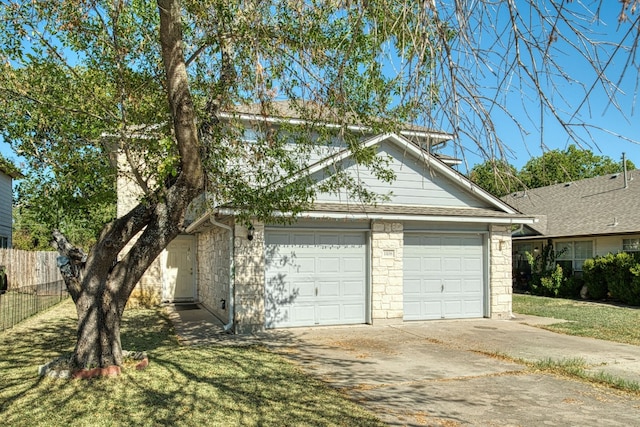 garage featuring a yard