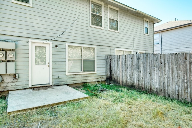 rear view of property with a patio area