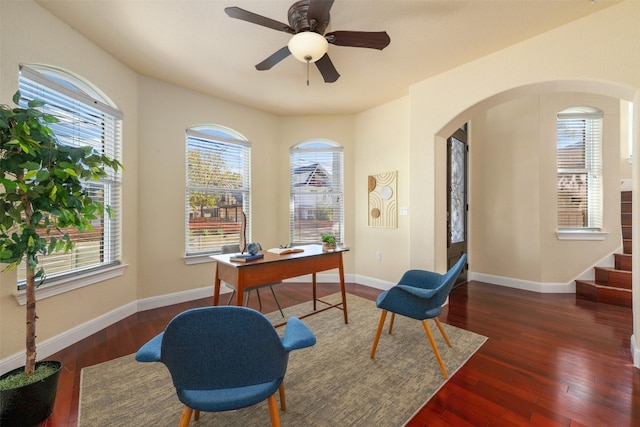 office space featuring ceiling fan and dark hardwood / wood-style floors