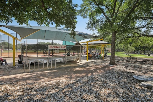 surrounding community featuring fence