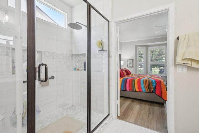 full bathroom with ensuite bathroom, ornamental molding, a stall shower, and a healthy amount of sunlight